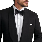 Men’s black formal tuxedo jacket with textured fabric and welt pockets