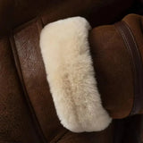 Soft shearling interior of women’s brown leather jacket
