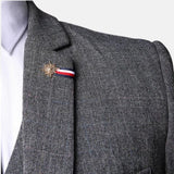 grey-three-piece-Close-up of grey tweed suit notch lapel, shoulder and decorative lapel pinsuit-for-mens