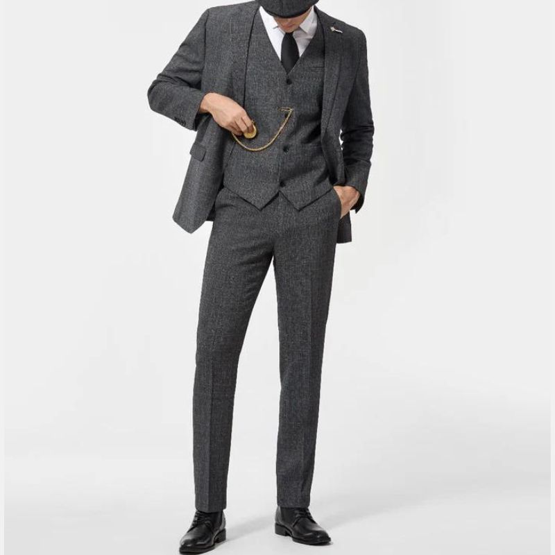 Men’s grey herringbone three-piece suit with matching vest and straight-cut trousers