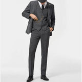 Men’s grey herringbone three-piece suit with matching vest and straight-cut trousers