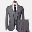 Men’s grey herringbone three-piece suit with jacket, vest and matching trousers