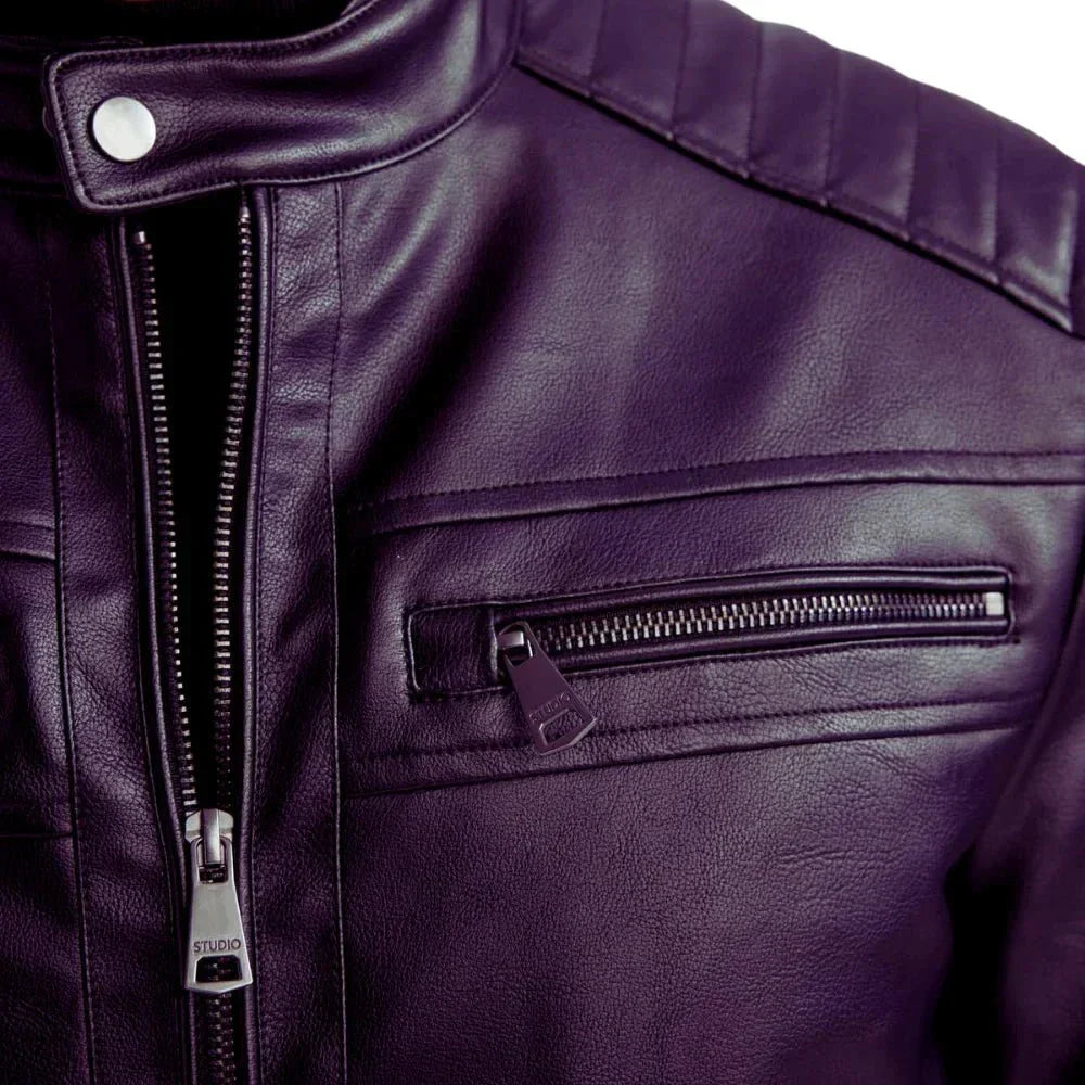 Close-up of purple leather café racer jacket with quilted shoulder and zip chest pocket