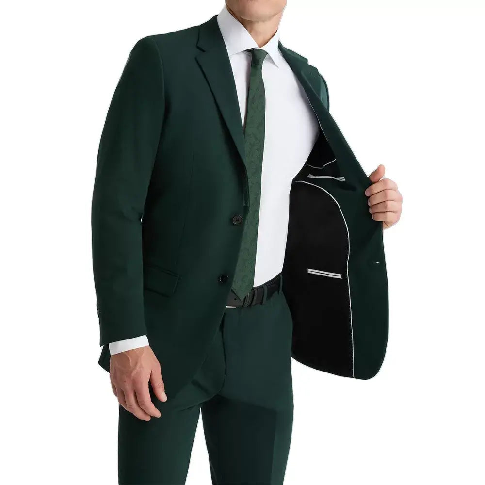 Side profile of a classic royal green three-piece suit showcasing its modern tailored fit and elegant silhouette.