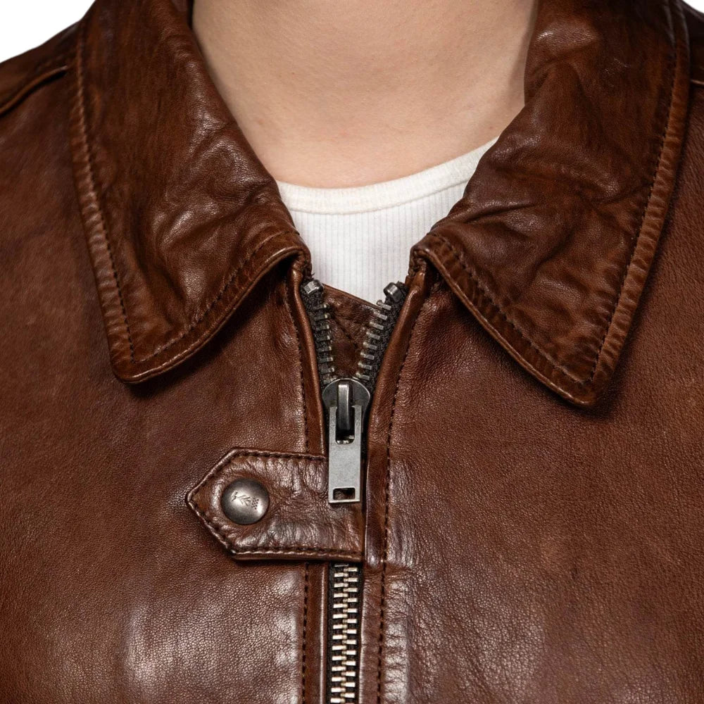 Distressed brown goatskin leather bomber jacket for women
